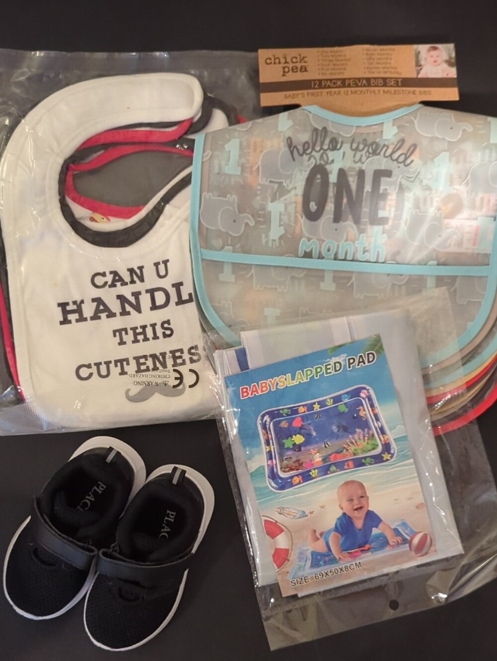 Bundle of NEW Baby Bibs, Tummy Time Slap Pad, & Walking Sneakers (4 Items)